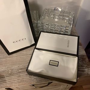 Gucci leather monogram wallet